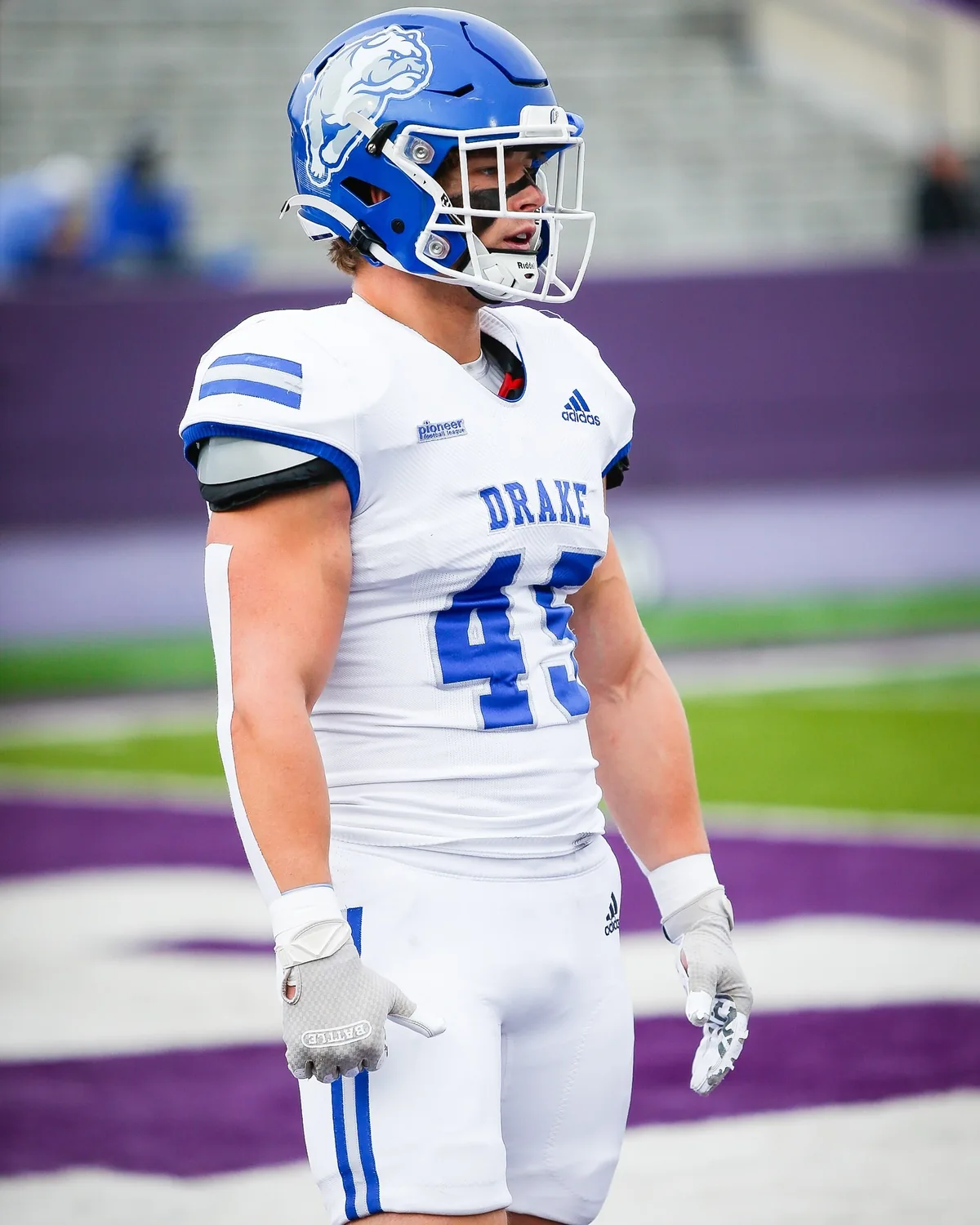Noah on the field in his white Drake uniform, number 45